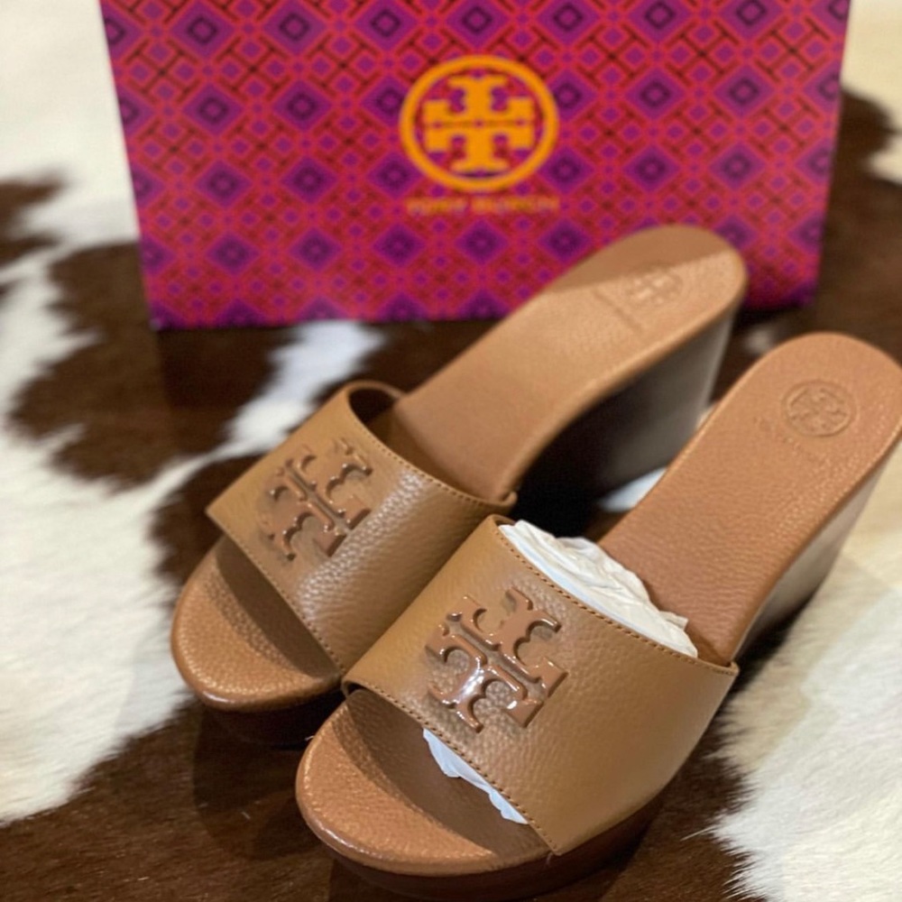 Women sandal, Brand new Tory wedges. Size 8.  elegant and comfy wt soft leather